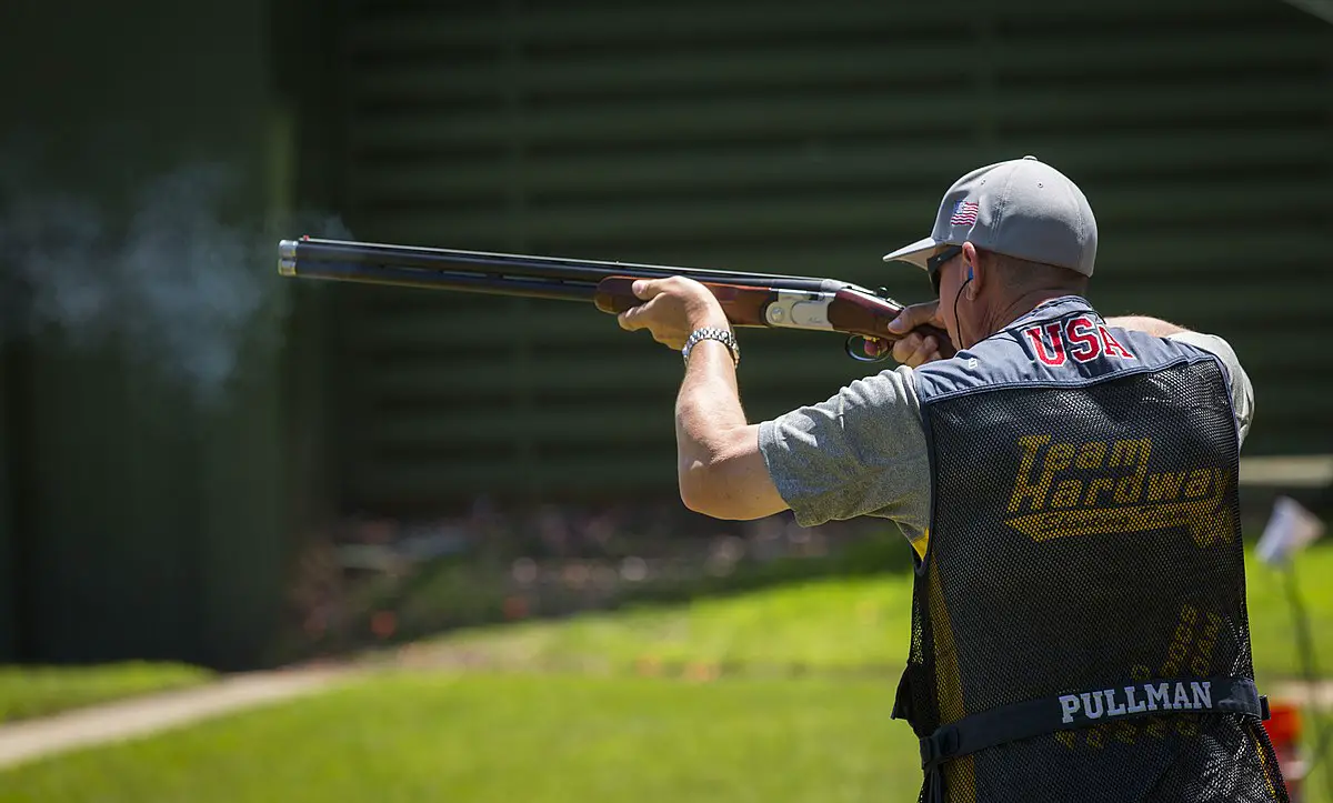 Man holding a riffle