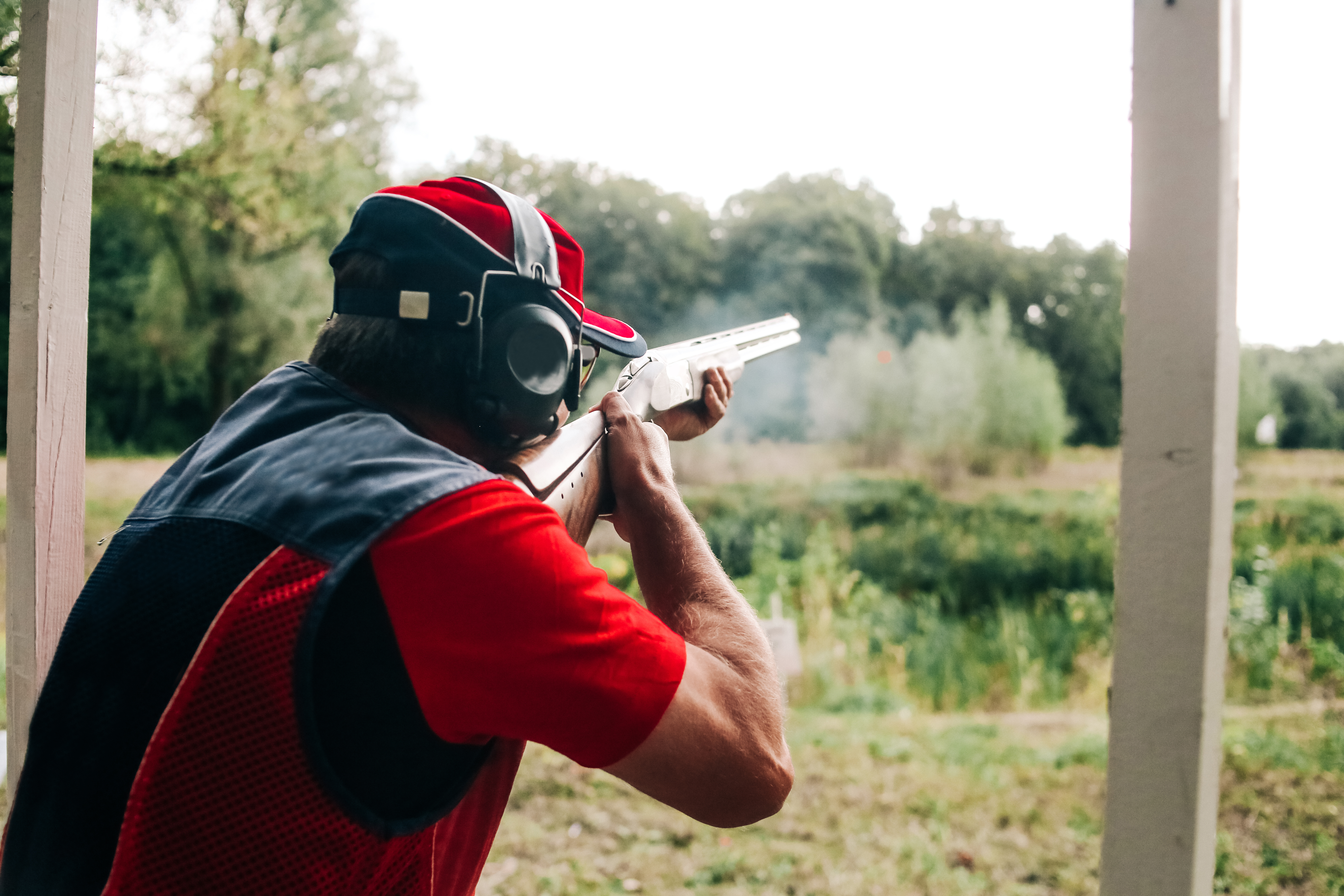 hunter shoots shotgun target special clothes headphones
